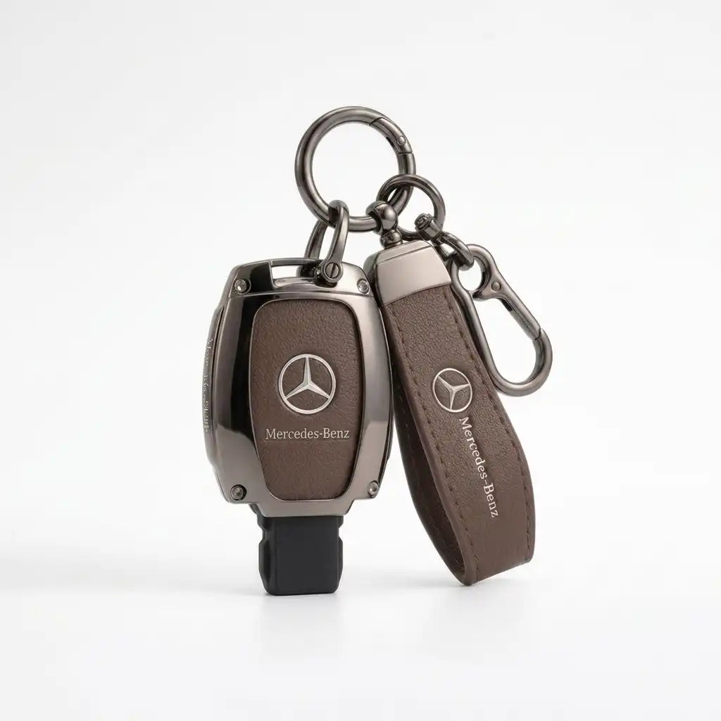 Mercedes-Benz key fob and leather case on a white background