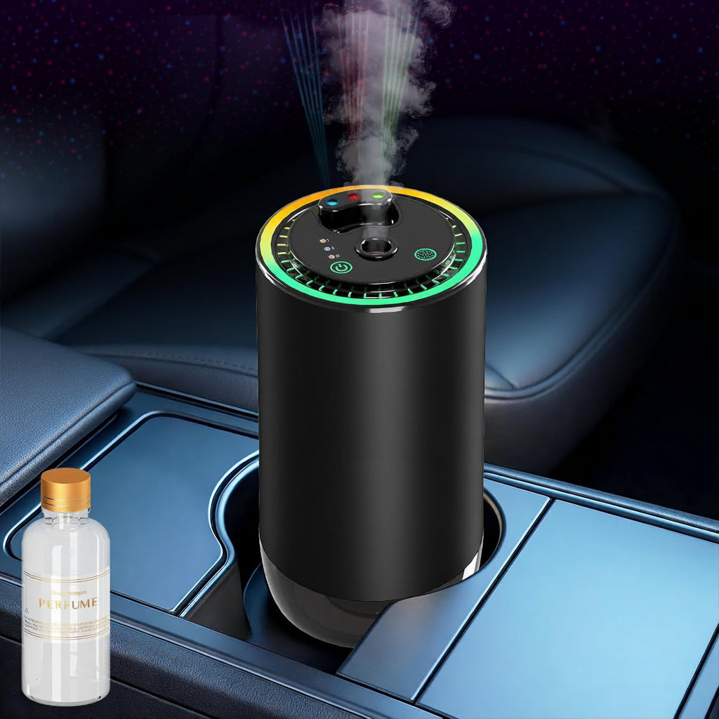 Black humidifier emitting mist on a car console with a bottle of perfume next to it.