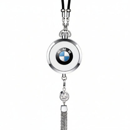 Silver necklace with BMW logo pendant on a white background