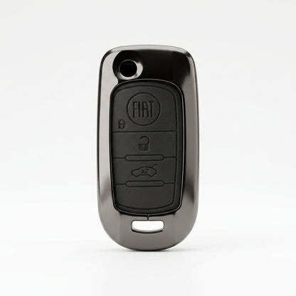 A matte black protective case designed for a Fiat key fob, shown on a clean white background. The case features a glossy black camera lens cutout at the top and a matching keyhole-shaped slot at the bottom.