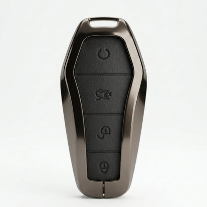 A custom metallic bronze key fob case with a black textured button panel, shown on a clean white background.