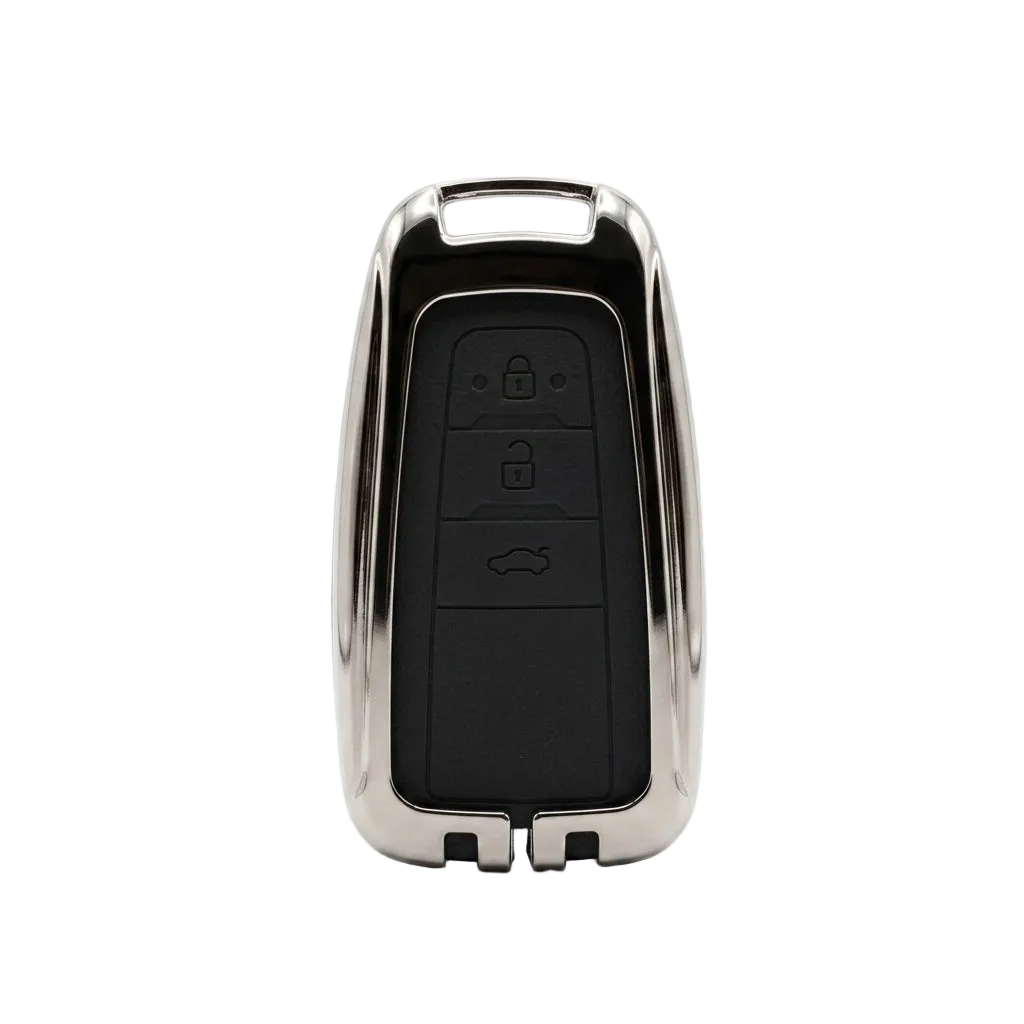 A polished silver metallic TOYOTA car key fob cover with a black leather button panel, shown on a clean white background from Capri Cars