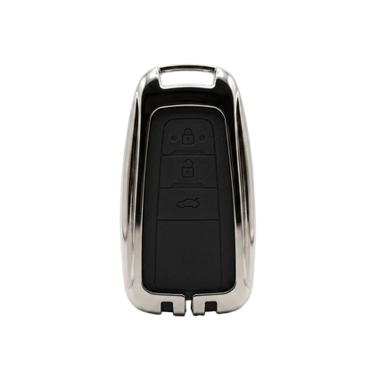 A polished silver metallic TOYOTA car key fob cover with a black leather button panel, shown on a clean white background from Capri Cars