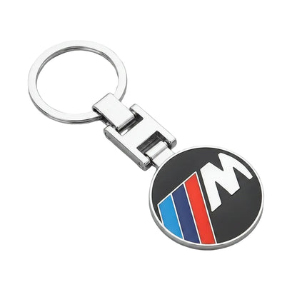 Keychain with BMW M logo on a dark background
