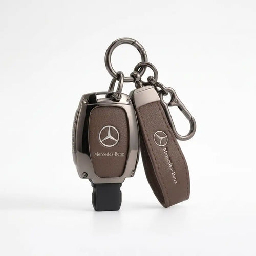 Mercedes-Benz key fob and leather case on a white background