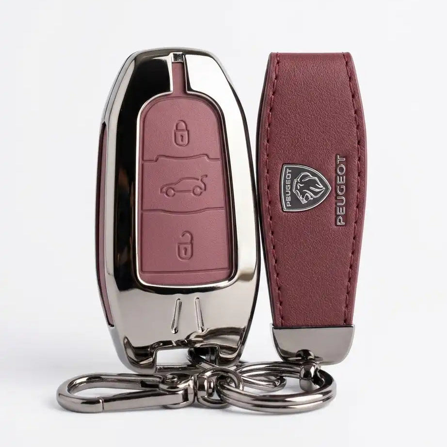 Car key fob with leather cover and Peugeot logo on a white background