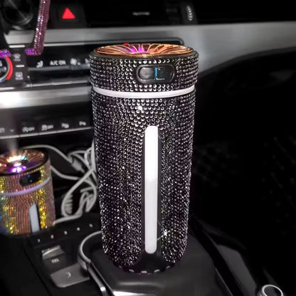 Decorative car diffuser with crystals on a car dashboard