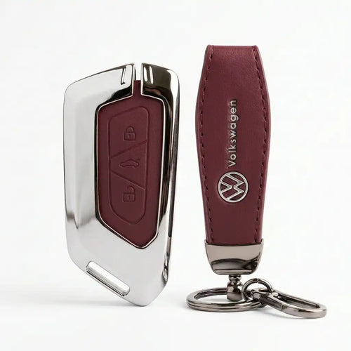 Car key fob with leather cover and Volkswagen logo on a white background
